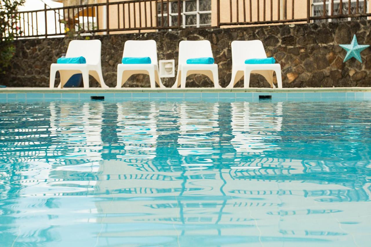 Dzama Hotel Гранд Байе Екстериор снимка