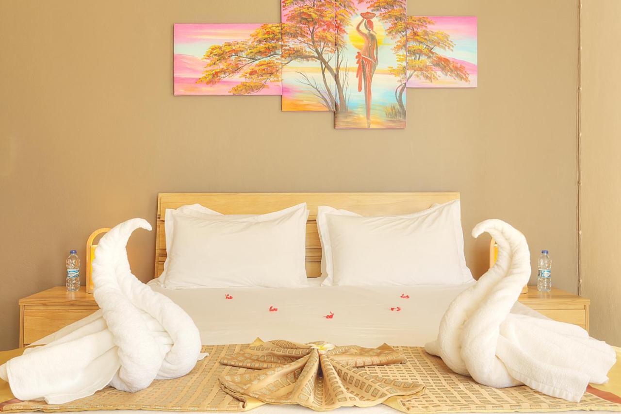 Dzama Hotel Гранд Байе Екстериор снимка